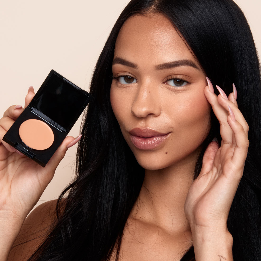 Palladio Under Eye Brightener in Medium Nude shade shown on medium skin to correct under-eye darkness.