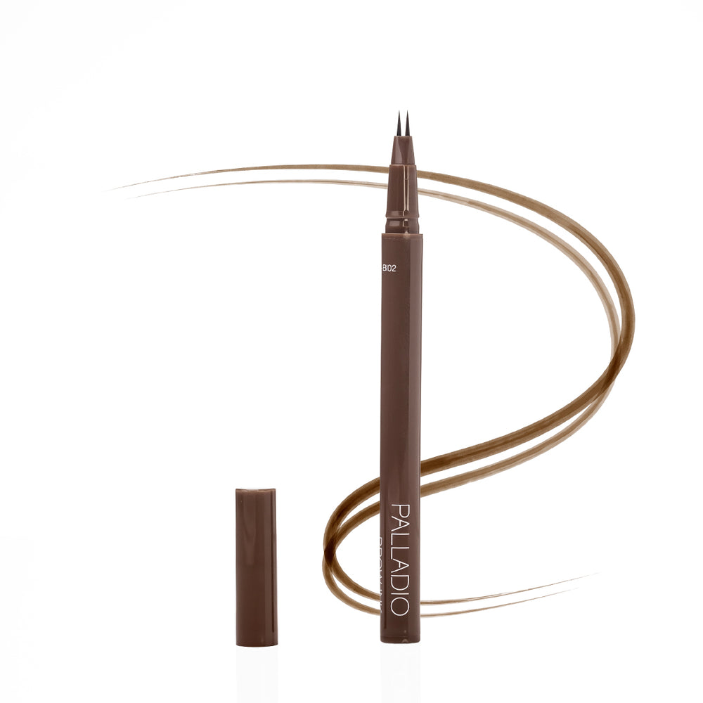 Palladio Brow Ink Micro Brow Pen in Auburn, an uncapped microblading-style pen with fine dual tips beside its cap, with a swooping auburn line illustrating hair-like brow strokes.