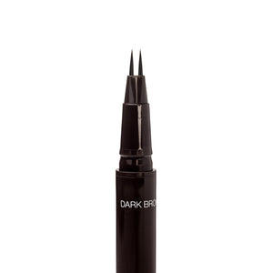 Close-up of the uncapped Palladio Brow Ink Micro Brow Pen in Dark Brown, showing the fine dual-precision brush tip and the "Dark Brown" shade label on the barrel.
