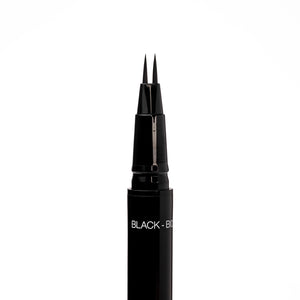 Close-up of the uncapped Palladio Brow Ink Micro Brow Pen in Black, showing the fine dual-precision brush tip and the "Black - BI05" shade label on the barrel.