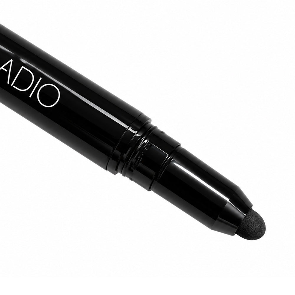 Close-up of the retractable smoky kajal end of Palladio Fifty-Fifty Cat-Eye + Smoky Kajal Eyeliner for soft, blended and smudged eye looks.