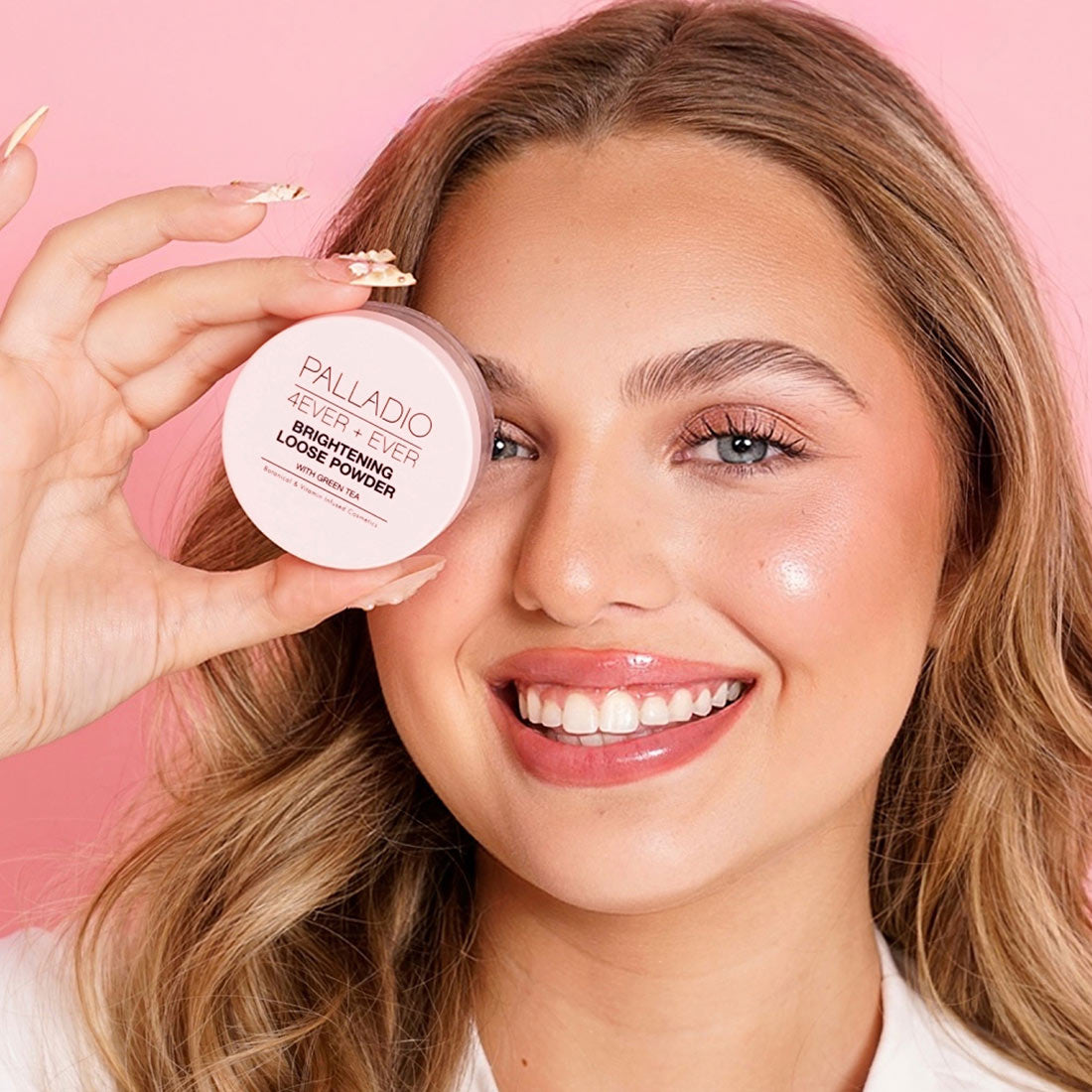 Palladio 4Ever + Ever Brightening Loose Powder with Green Tea, open jar with pink powder swatch on white background